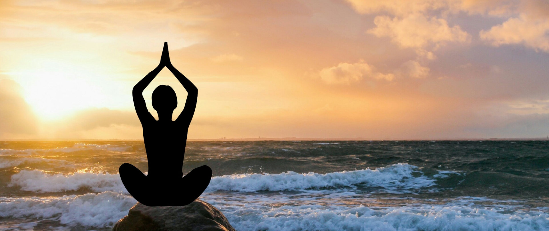 Yoga asana on a beach with beautiful sunset